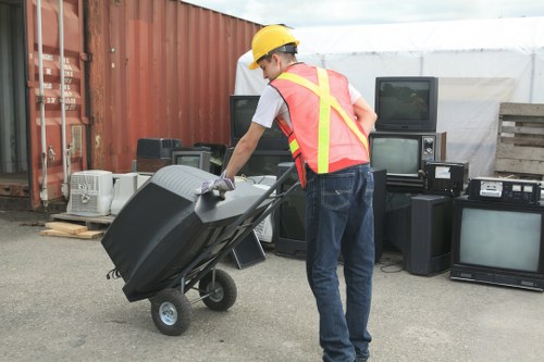 Secure lockable skip with waste being loaded